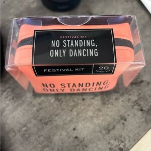 NWT “NO STANDING, ONLY DANCING” Festival Kit in a cute zippered pouch.